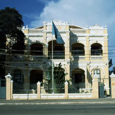 Colonial Building and a cyclo man, Phnom Penh